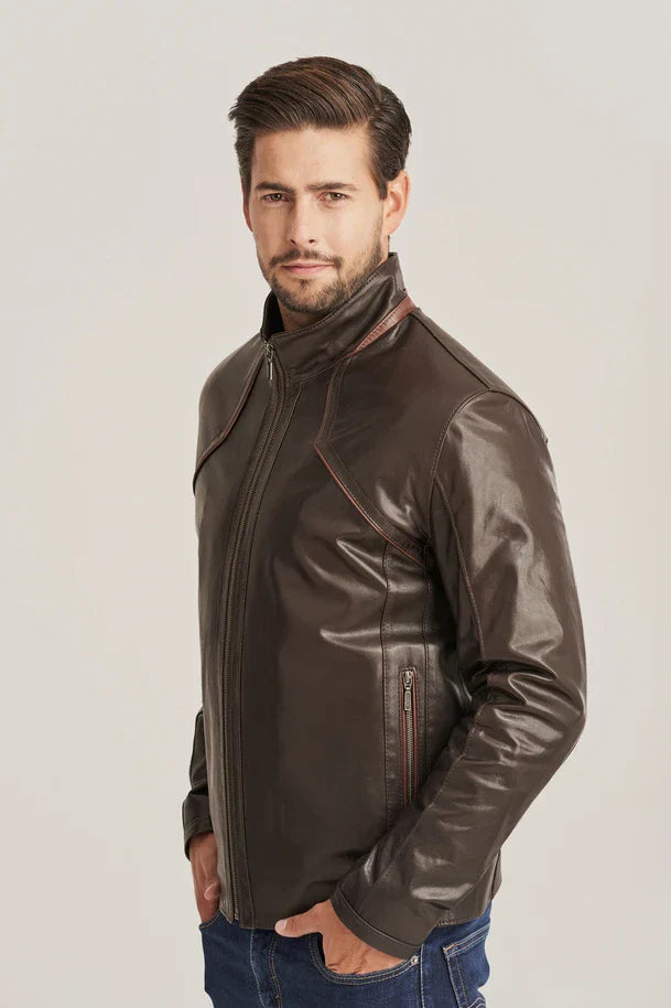 Man wearing a brown leather jacket on a plain background