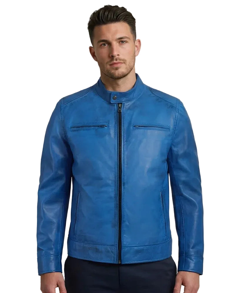 Man wearing a blue leather jacket on a gray background