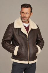 Men’s brown B3 leather bomber jacket with a cream aviator collar, twin throat straps, gold-tone zipper and welt waist pockets.