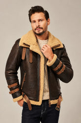 Men’s brown B3 aviator leather jacket with tan shearling trim, a broad collar and double buckle straps on each sleeve.