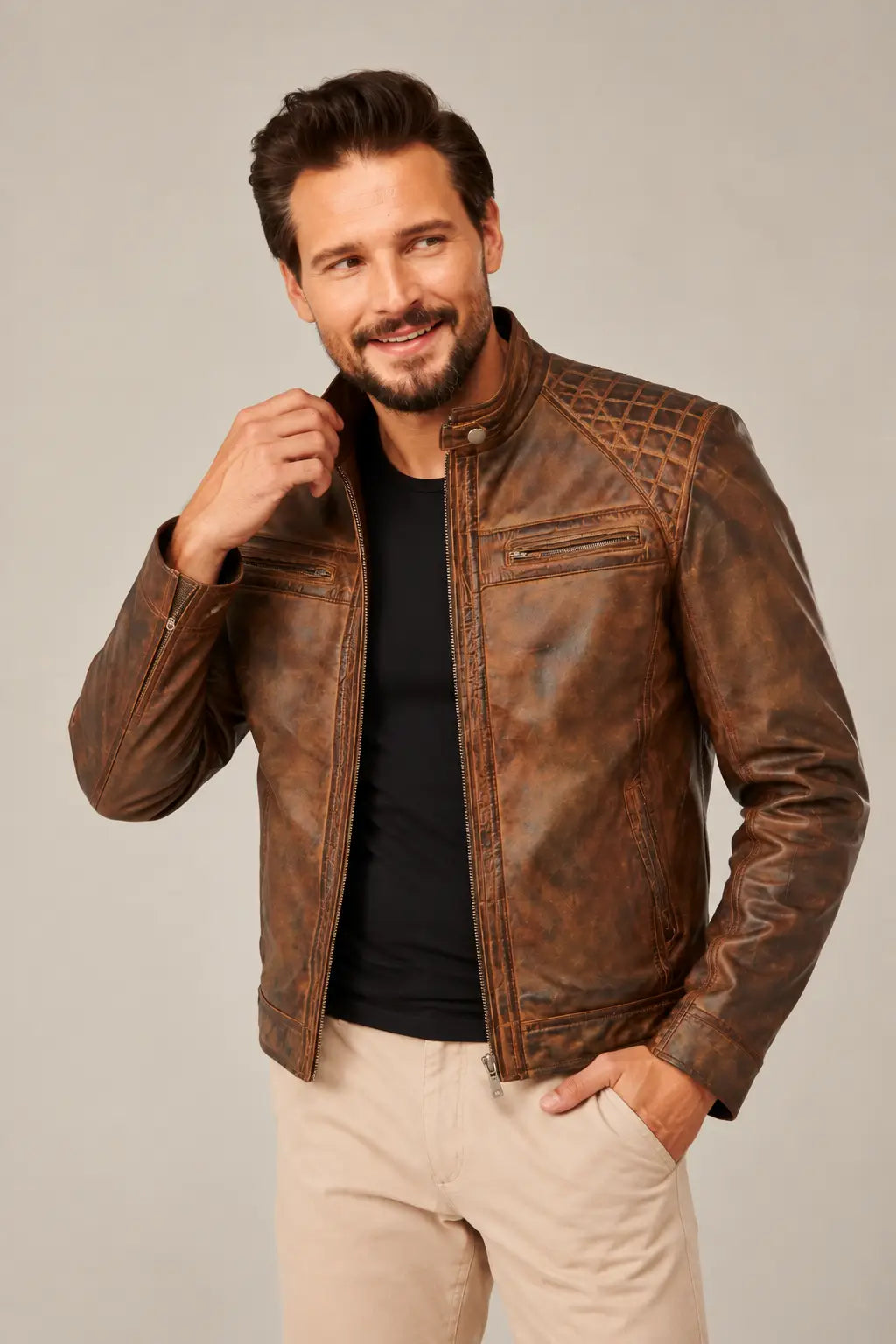 Alex men’s distressed brown cafe racer leather jacket with diamond-stitched shoulders, snap-tab collar and two chest zippers.
