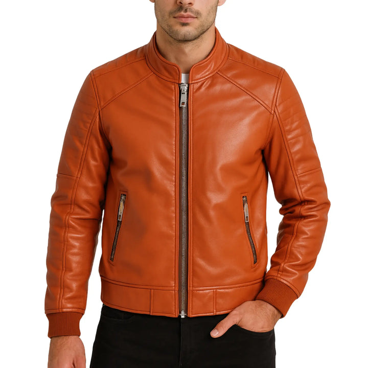 Orange leather jacket worn by a person on a white background