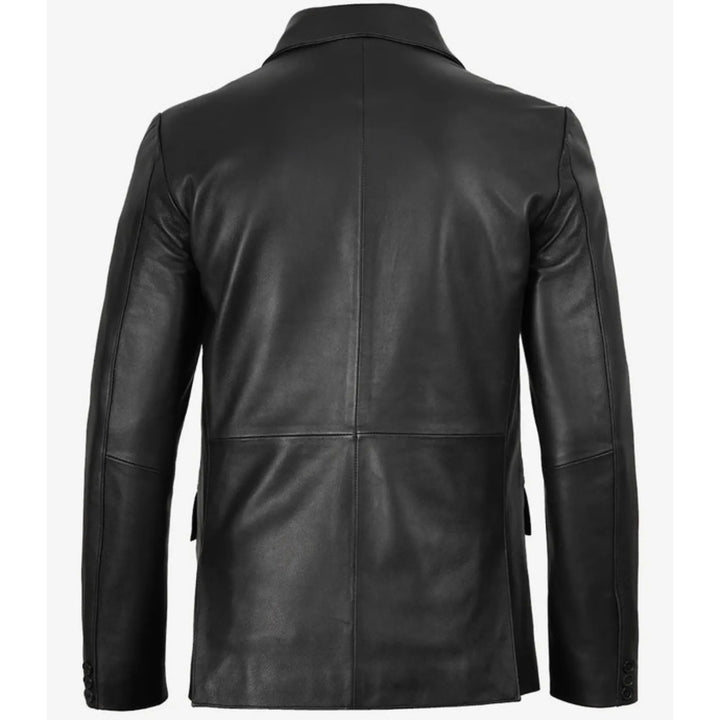Black leather jacket shown from the back on a white background