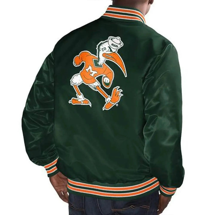 Green jacket with a cartoon character on the back, worn by a person.