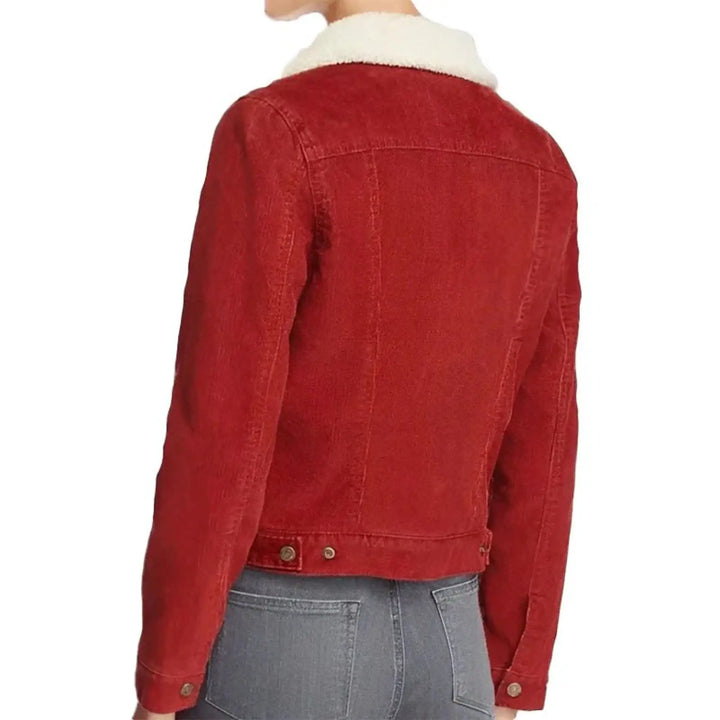 Red denim jacket with white fur lining on a white background