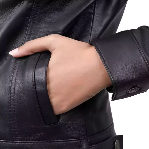Close-up of a person wearing a black leather jacket with a hand in the pocket.